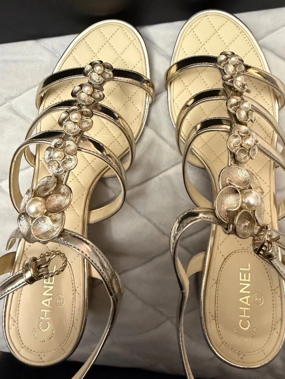 Chanel gold sandal with pearl flower detail